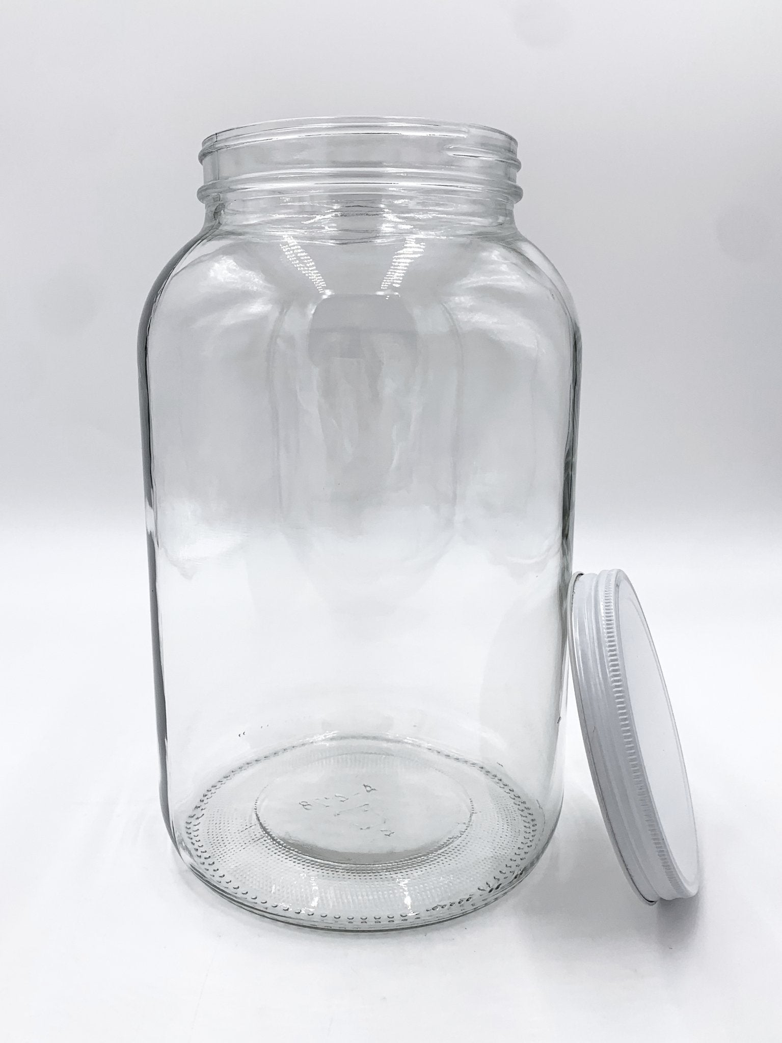 https://betterbeveragebottles.com/cdn/shop/products/1-gallon-glass-jars-with-metal-lids-4-pack-880255_1024x1024@2x.jpg?v=1698255805